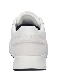 White sneaker with a suede and mesh upper, padded collar, and black outsole. Features "Josef Seibel" branding on the heel.