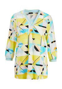 Mehrfarbige Tunika mit V-Ausschnitt, die geometrische Muster in Gelb, Blau, Pink und Schwarz aufweist. Lange Ärmel mit gestreiften Bündchen.