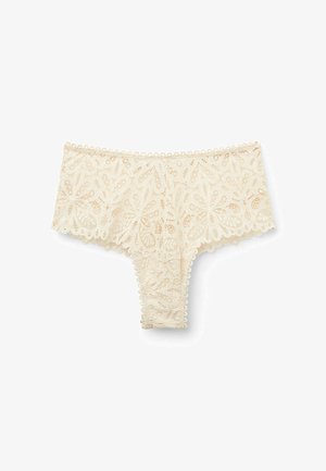 Lace brief in light cream, featuring floral patterns, scalloped edges, and a soft texture. Designed with a hipster cut for comfort.