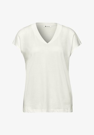 Valkoinen lyhythihainen V-kaula-aukkoinen puuvillainen T-paita, jossa löysä istuvuus.
