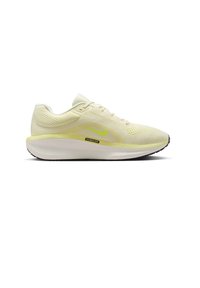 Scarpa da corsa in rete gialla chiara con suola bianca, baffo Nike giallo neon e etichetta "Cushlon" sulla suola intermedia, profilo laterale.