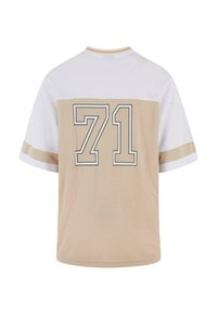 Short-sleeve shirt featuring a beige and white color block design; large "71" printed on the back with contrasting black outline.