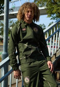 Puma - Sportinė striukė - gruenrosa Miniatiūros vaizdas 1