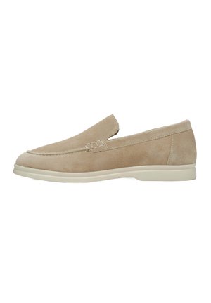 Beige suede slip-on shoe with a smooth texture, rounded toe, and minimal stitching details. White rubber sole for comfort and flexibility.