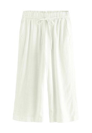 Białe lniane szorty z elastycznym paskiem w talii i regulowanym sznurkiem, posiadające dwie kieszenie boczne oraz luźny, swobodny krój.