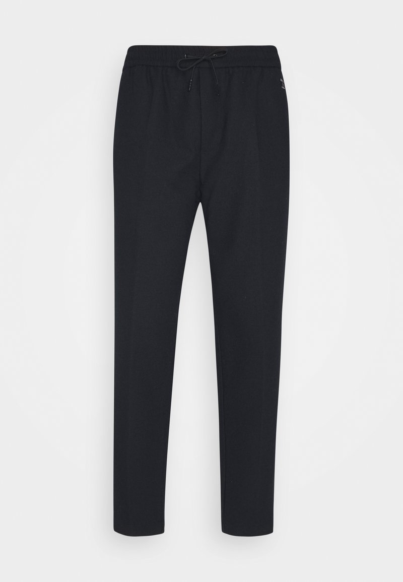 Sorte joggingbukser med snøre i taljen, tapered ben og en glat tekstur. Ingen synlige mønstre eller hardware-detaljer.