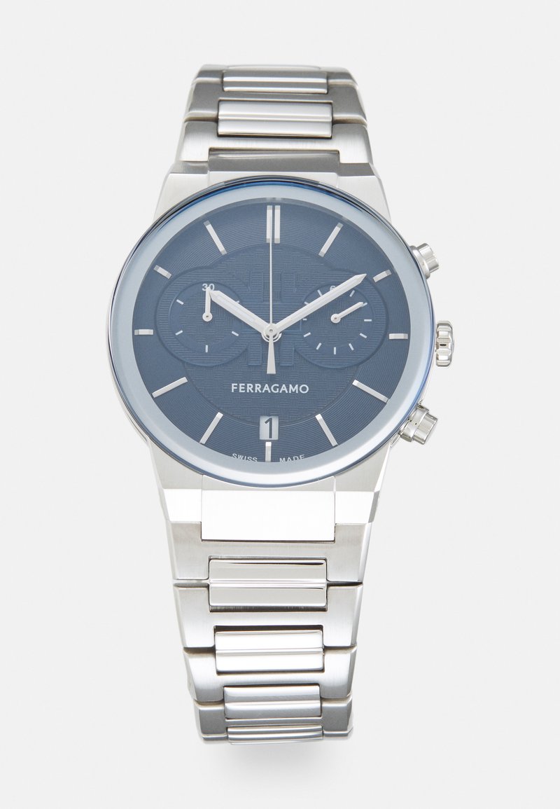 Stainless steel watch with a blue dial, silver hour markers, and chronograph features. Bracelet-style strap with polished and matte links.