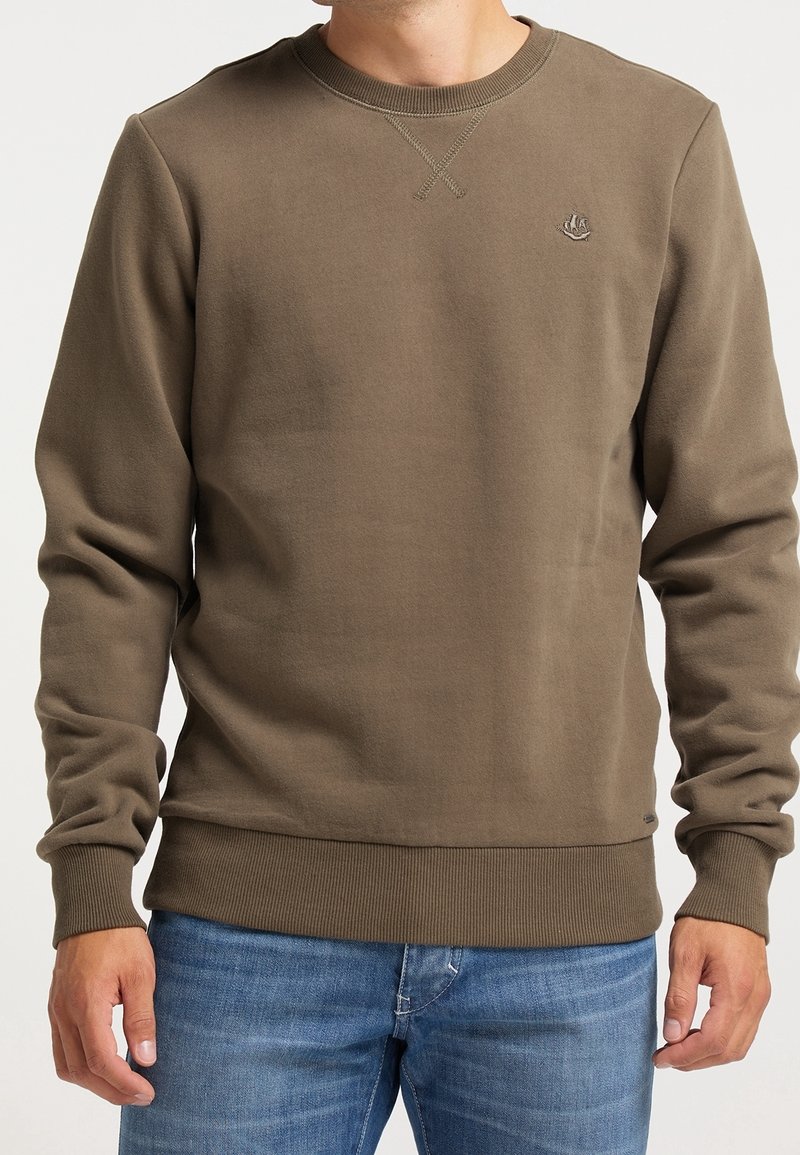Olive green sweatshirt with a round neck, ribbed cuffs, and hem. Features subtle logo on chest and cross-stitch detailing at neckline.