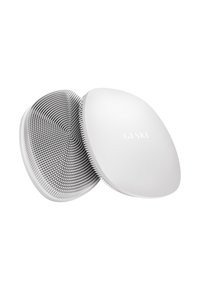 Brosse à cheveux avec un corps en plastique blanc, dotée de fines brins métalliques en motif spiralé. Le design est compact et arrondi.