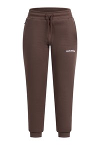 Braune Jogginghose mit elastischem Bund, Kordelzug, Seiten Taschen, gerippten Bündchen und weißem "SMILODOX"-Logo auf dem linken Oberschenkel.