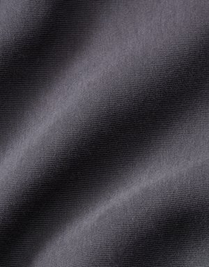 Nike Sportswear JOGGERS TECH - Træningsbukser - anthracite safety orange