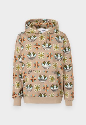 Beige hooded sweatshirt featuring a multicolored geometric pattern with various shapes, including baskets and floral designs. Soft texture.
