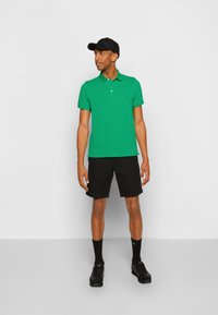 Tommy Hilfiger SLIM - Polo - grassy meadow