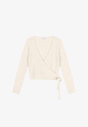 Cardigan de couleur crème en matériau doux et texturé. Il est doté de manches longues et d'une fermeture par lien à la taille.