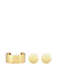 Conjunto de joyería en metal dorado que incluye una ancha pulsera de brazalete y pendientes de botón redondos a juego, todo con un acabado liso y pulido.