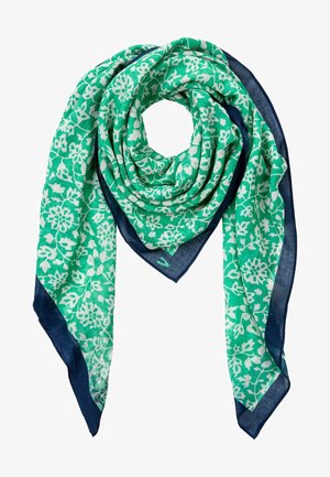 Grüner Schal mit Blumenmuster, weißen Blumen und marineblauen Rändern. Hergestellt aus leichtem Stoff, mit weicher Textur und flatterndem Design.