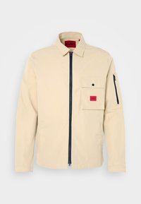 Unselected, open beige