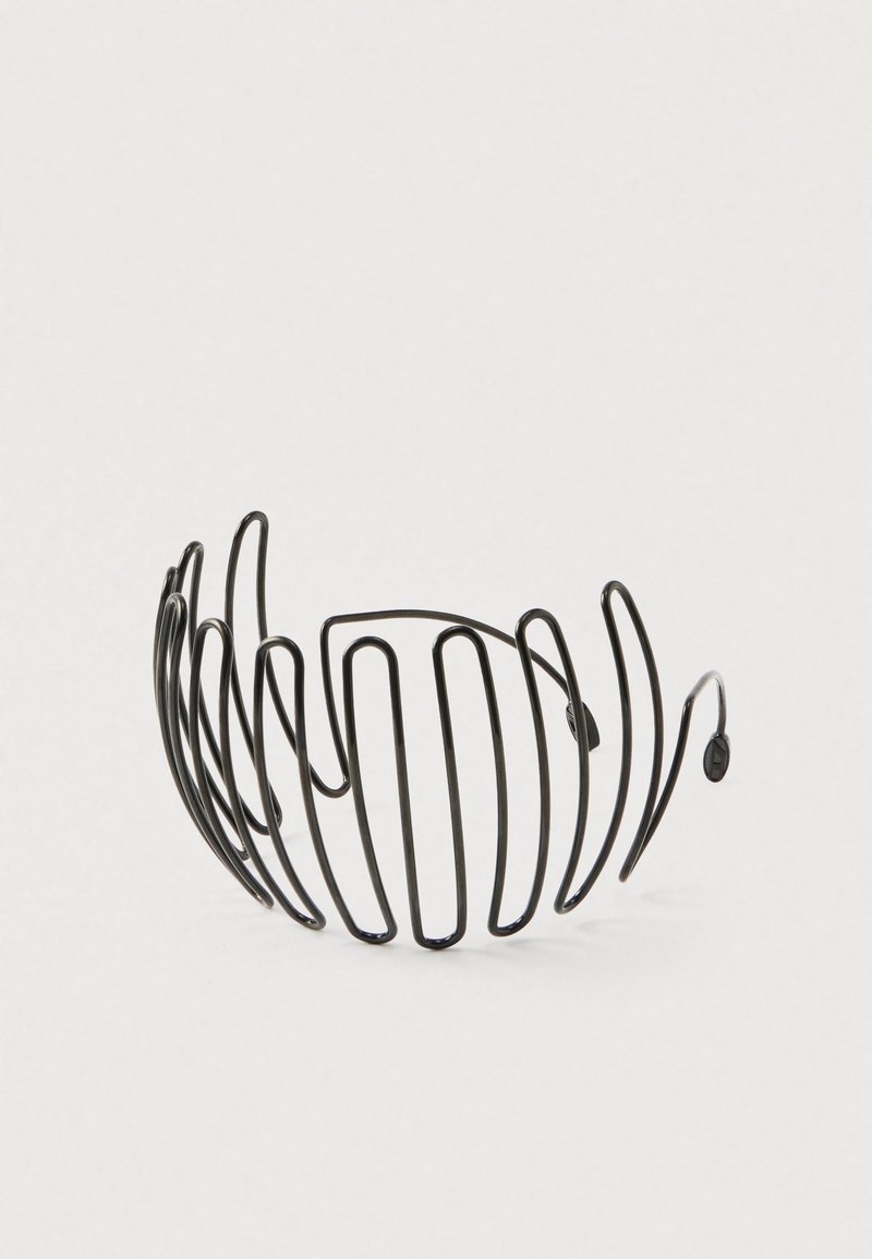 Black metal hair comb with evenly spaced, curved prongs arranged in a semi-circle on a white background.