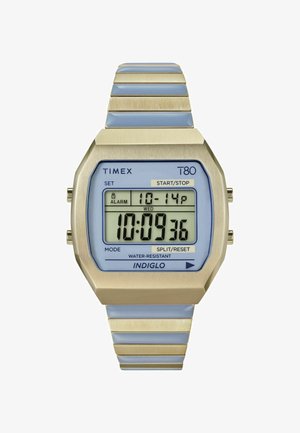 Digitaluhr mit blauem LCD-Display, hexagonalem Gehäuse aus Edelstahl und metallisch silbernen Gliedern am Armband. Verfügt über INDIGLO-Hintergrundbeleuchtung.