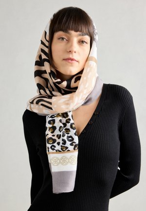 Többszínű sál, állatmintákkal bézs, fekete és szürke színben, mintás szegéllyel. Puha anyagból készült, a nyak köré terül.