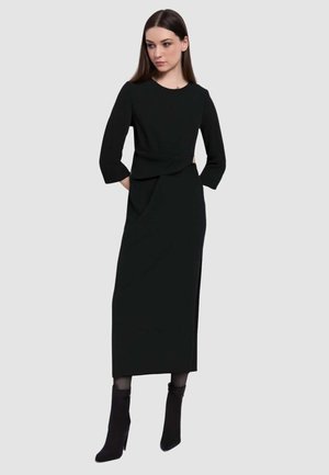 Vestito di maglina - nero