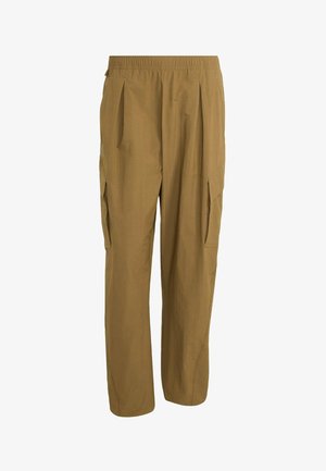 Pantalon marron à coupe ample avec taille élastique et poches cargo latérales, présentant des plis à l'avant pour un style décontracté.