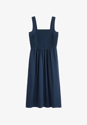 Robe bleu marine froncée avec des bretelles larges, un bustier ajusté et unejupe fluide. Fabriquée en tissu doux, elle présente une texture lisse et une coupe mi-longue.