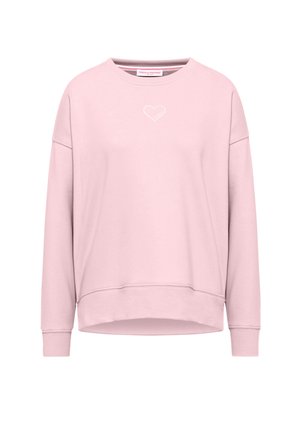 Różowy sweatshirt wykonany z miękkiego materiału, charakteryzujący się luźnym krojem, okrągłym dekoltem i małym białym wzorem serca na środku.