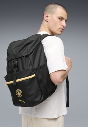 Puma, MANCHESTER CITY FTBLCULTURE 24 L RUCKSACK UNISEX - Tagesrucksack - black-flaxen
