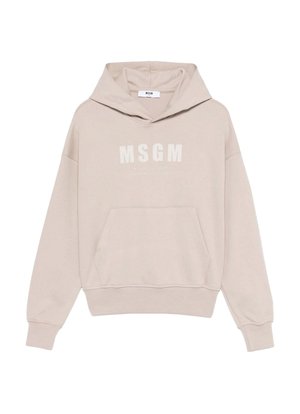 Felpa beige con cappuccio, tasca a marsupio, maniche lunghe, polsini e orlo a costine e logo "MSGM" in grassetto sul petto.