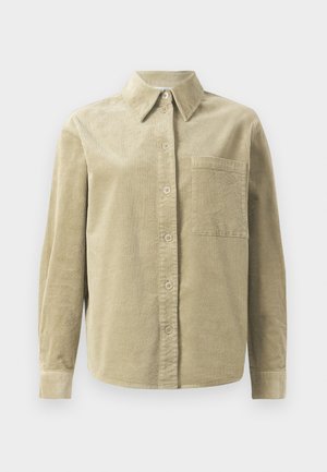 Lys grønn kordfløyel skjorte med knappelukking foran, krage, enkelt brystlomme og lange ermer med knappefeste.