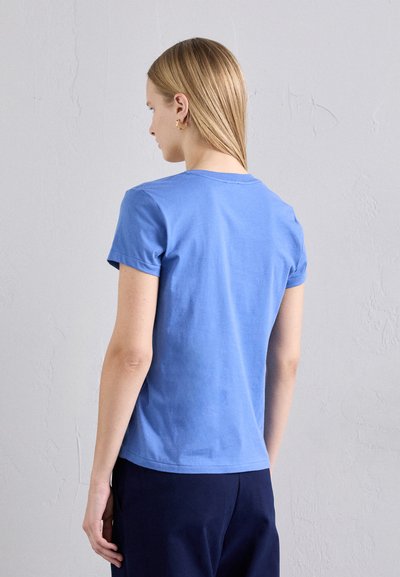 Blue short-sleeve T-shirt made of cotton; has a classic crew neckline and a straight cut, with a smooth texture.