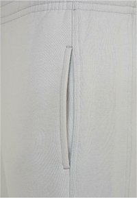 Urban Classics Tracksuit bottoms - lightasphalt