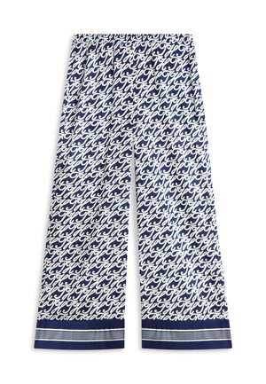 Donkerblauwe wijdvallende broek met witte sierlijke schriftprint en gestreepte zoomdetail.