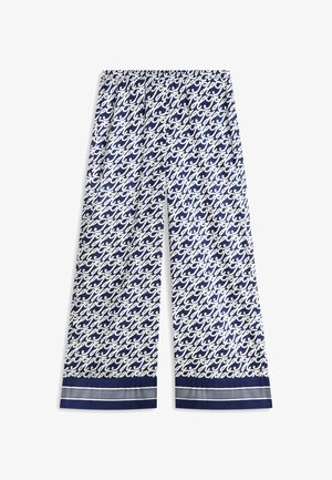 Marineblaue Hosen mit weitem Bein, verziert mit einem weißen Kursivschriftmuster und gestreiften Saumdetails.