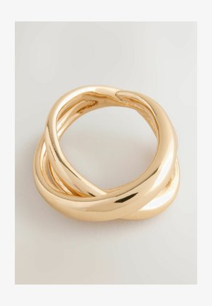 Zelta vērts, kas ir savīts ar gludu, atspoguļojošu virsmu. Pieder divu pavedienu dizains, kas savijas kopā, radot drosmīgu, moderna izskatu.