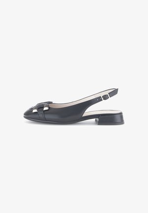 Black slingback shoe made of smooth leather. Features a rounded toe, small block heel, and decorative strap with metallic accents.