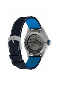 Zadný pohľad na hodinky Timex s čiernym a modrým koženým remienkom, viditeľným mechanickým pohybom a puzdrom z nehrdzavejúcej ocele.