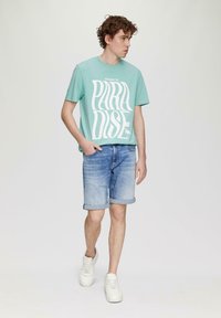 QS Triko s potiskem - helles türkis