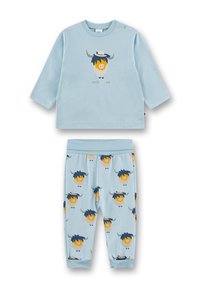 Hellblaues Baumwoll-Pyjama-Set mit einem langärmligen Oberteil, das ein Cartoon-Bull-Graphic zeigt, und passenden Hosen, die mit demselben Design bedruckt sind.