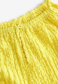 Next CRINKLE REGULAR FIT - Overall / Jumpsuit - yellow