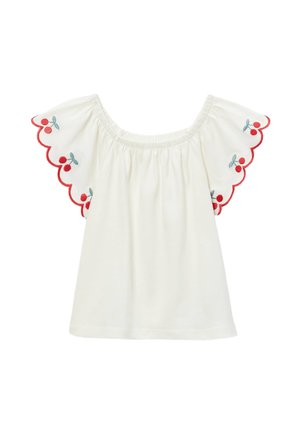 Blouse blanche épaules dénudées avec manches festonnées brodées de cerises rouges et de feuilles vertes.
