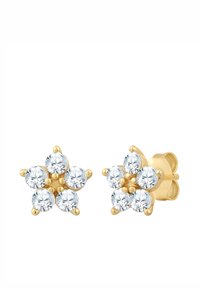 Zelta ziedu formas auskari ar sešiem apaļiem, caurspīdīgiem kristāliem katrā auskarā, kas novietoti uz pulēta zelta fona.