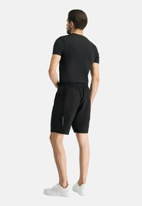 Formbelt 2-IN-1 - Jogginghose - schwarz