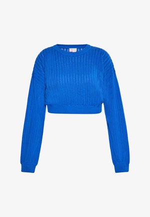 Zila norakota džemperis ar ribotu tekstūru, garām piedurknēm un apaļu apkakli. Iekļauj pagriestu detalizāciju plecos un elastīgus aproces.