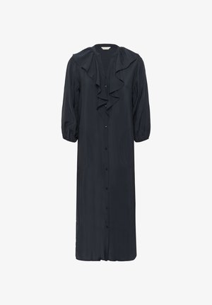 Mørkeblå, langærmet kjole med flæsekrave og knaplukning foran. Har sidelommer og et let, svævende stof.