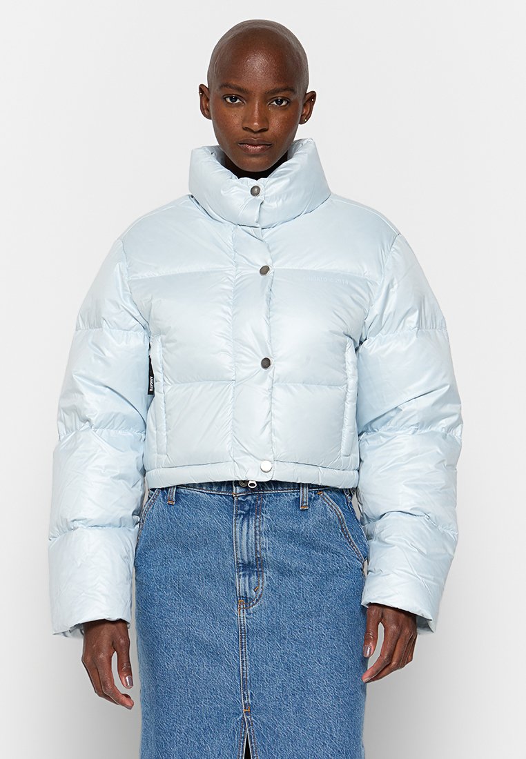 Axel Arigato Gewatteerde jas lichtblauw