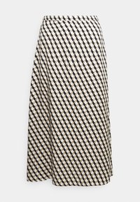 Une jupe de longueur genou en tissu léger, ornée d'un motif géométrique en crème, noir et beige, avec une texture lisse.