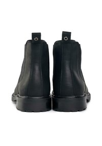 Black leather ankle boots with elastic side panels, round toes, pull tabs, and textured rubber soles. Simple design, no patterns or embellishments.