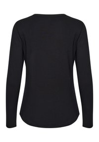 Chemise noire ajustée à manches longues avec encolure ronde, vue de dos, avec un ourlet légèrement incurvé.